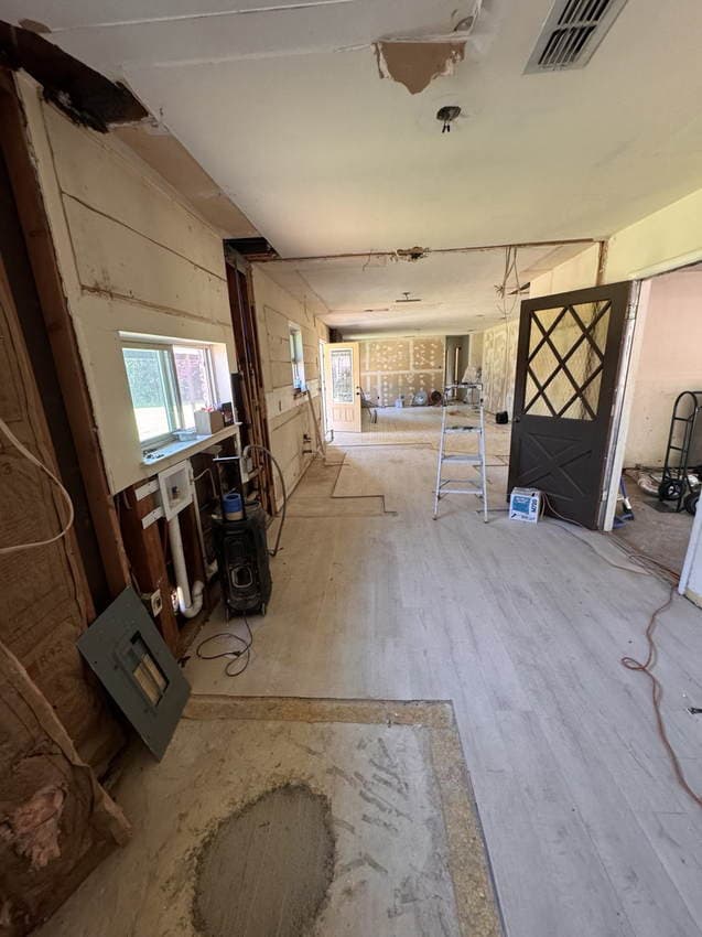 Wide demolition and starting-point view from this Built By Alvarez whole-home renovation.