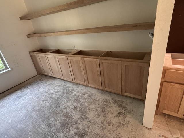 Kitchen cabinetry taking shape during the whole-home renovation.