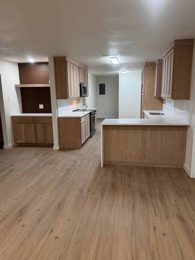 Completed Built By Alvarez kitchen after the whole-home renovation and kitchen reconstruction.